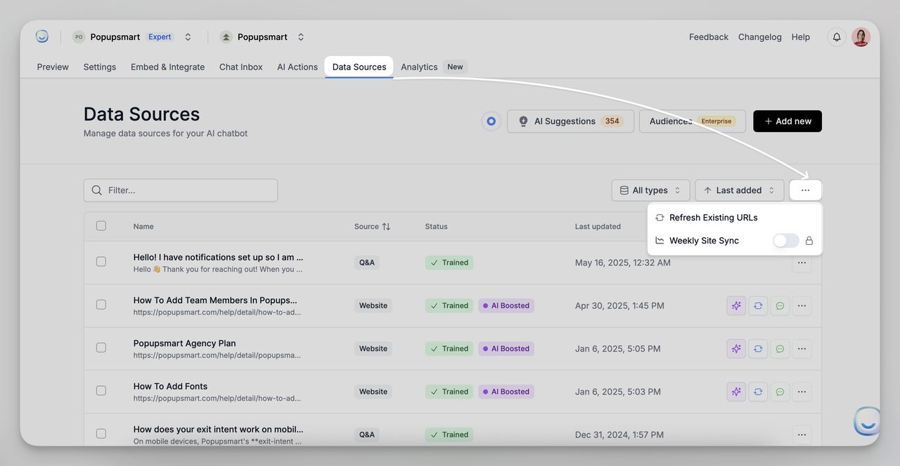 LiveChatAI Data Sources dashboard showing trained website content and weekly sync options